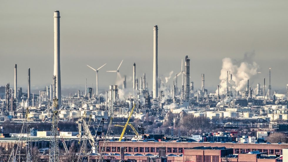 Oil refinery and wind turbines